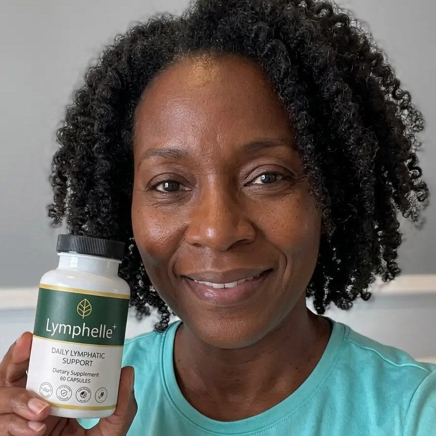 Margaret Ellison holding a bottle of Lymphelle+